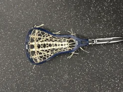 Used STX FORTRESS W/DEBEER 325 Wmn Atk/Mid Complete Stick Navy Blue