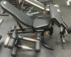 Used POWERTEC/LEG CURL/ARM CURL FID Bench